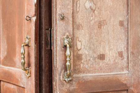 Old wooden door with vintage handleのeditorial素材