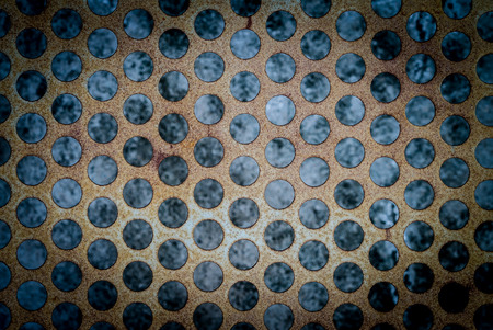 Old and rusty of mesh iron plateの写真素材