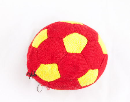 Torn fabric football 
,a dog's toy,on white backgroundの写真素材