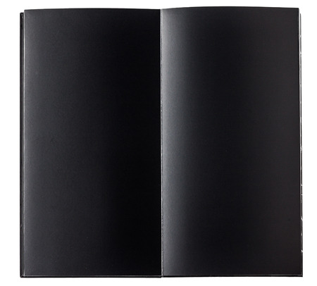 Blank page of black book isolated on whiteの写真素材