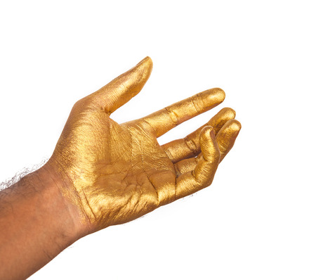 Golden hand isolated on whiteの写真素材