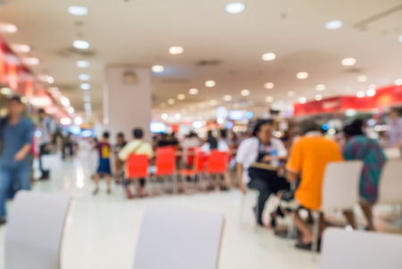 Abstract blurred restaurant or food center with light bokeh backgroundの写真素材