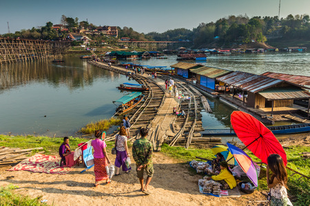 Kanchanaburi,Thailand - March 15th, 2015: Tourist travel to famous place,bammboo bridge a landmark of Sankhlaburi on 15 March 2015のeditorial素材
