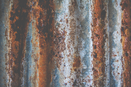 Rusty galvanized iron wall plate backgroundの写真素材