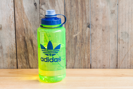 Bangkok,Thailand - August 27th, 2015: Transparent green Adidas32oz1L bottle for containing water on 26 March 2015のeditorial素材