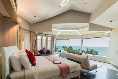 Modern style of living room with bed and sea view in resort ,Thailandのeditorial素材