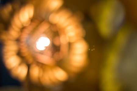 Defocus of vintage lamp with light golden backgroundの写真素材