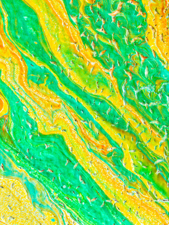 Beautiful abstract background. Pouring acrylic paint on canvas. Contemporary art.の写真素材