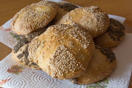 bread with seeds on the tableの写真素材