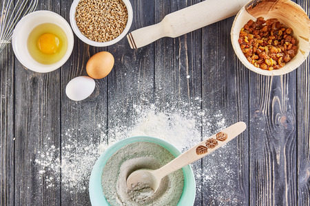 Hands working with dough preparation recipe bread, pizza or pie making ingridients, food flat lay on...