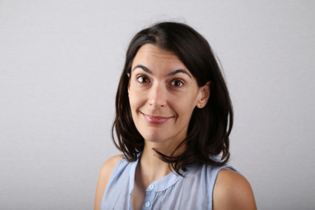 Portrait of an authentic smart looking woman smiling at the camera