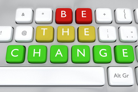 Render illustration of computer keyboard with
the print BE THE CHANGE on buttons, each word in a different colorの写真素材