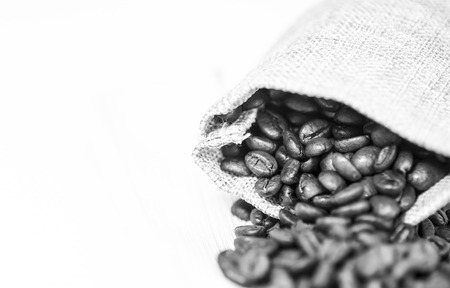 Coffee beans sack in monochromatic colors on white backgroundの写真素材