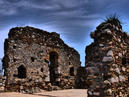 Castelmola Ancient Ruins in Sicily with dramatic skiesの写真素材