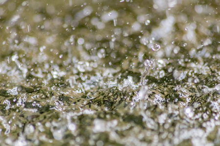Splash of water during rainの写真素材