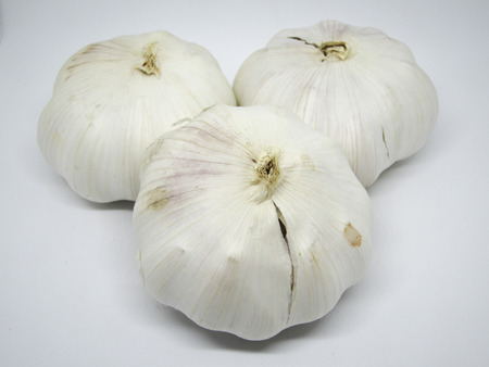garlic on white background (selective focus)の写真素材