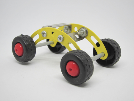 steel toy car on a white background (education toys) (selective focus)の写真素材