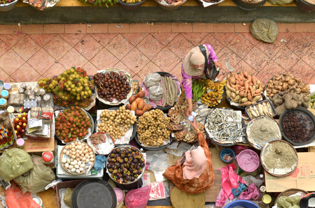 Kota Bharu,Kelantan,Malaysia - December 12th 2012 : seller and the interior environment Pasar besar siti khadijah fresh market located in Kota Bharu, Kelantan, Malaysiaのeditorial素材