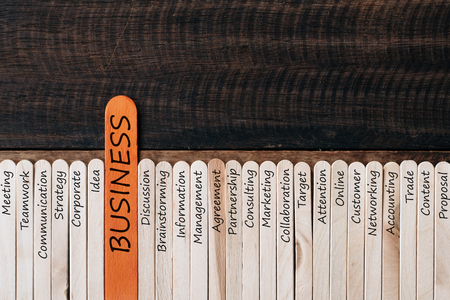 Wooden stick with Business related word. Business conceptの写真素材