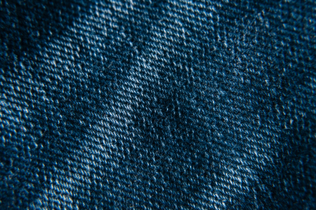 macro closeup of blue denim jeans texture for background. fashion concept advertisingの写真素材