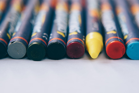 colorful crayon on white background. art and school concept