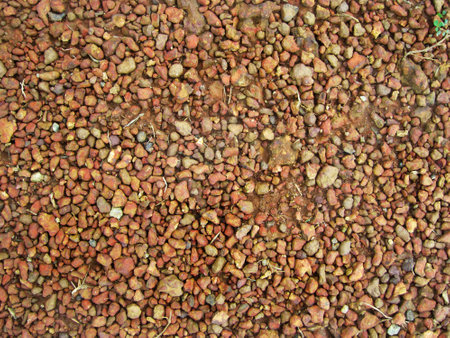 top view of a gravel dirt road. can be use for background and wallpaperの写真素材