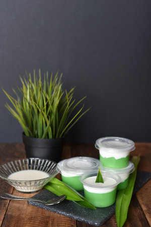 Traditional Malaysia delicacy known as " Tepung Pelita or Kuih Tako" in a cup. Street food Malaysiaの写真素材