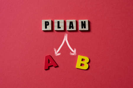 Wooden alpahabet tiles with plan A or B. Concept of planning and businessの写真素材