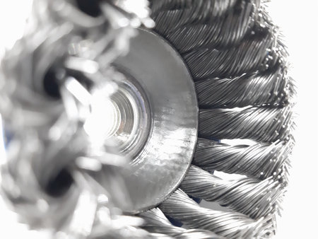 Wire brush for mechanical cleaning of metal on white backgroundの写真素材