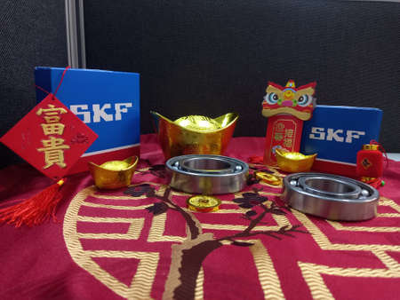 Medan, Indonesia - January 20, 2022: SKF Bearings on table for greetings Chinese new yearのeditorial素材