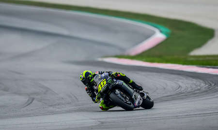 SEPANG, MALAYSIA - NOVEMBER 03, 2019 : Valentino Rossi (46) of Italy and Yamaha Factory Racing during the Malaysia Motorcycle Grand Prix (MotoGP) at Sepang International Circuit (SIC).のeditorial素材