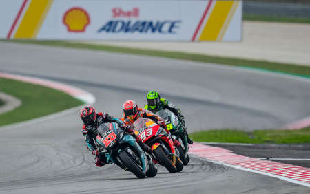 SEPANG, MALAYSIA - NOVEMBER 03, 2019 : Fabio Quartararo of France and Petronas Yamaha SRT rides during the Malaysia Motorcycle Grand Prix (MotoGP) at Sepang International Circuit (SIC).のeditorial素材