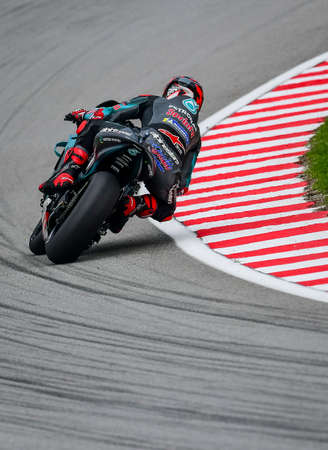 SEPANG, MALAYSIA - NOVEMBER 03, 2019 : Fabio Quartararo of France and Petronas Yamaha SRT rides during the Malaysia Motorcycle Grand Prix (MotoGP) at Sepang International Circuit (SIC).のeditorial素材