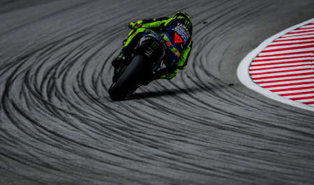 SEPANG, MALAYSIA - NOVEMBER 03, 2019 : Valentino Rossi (46) of Italy and Yamaha Factory Racing during the Malaysia Motorcycle Grand Prix (MotoGP) at Sepang International Circuit (SIC).のeditorial素材
