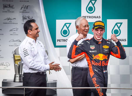 KUALA LUMPUR, MALAYSIA - OCTOBER 01, 2017 : Race winner Max Verstappen of Red Bull Racing celebrates on the podium during Malaysia Grand Prix at Sepang International Circuit.のeditorial素材
