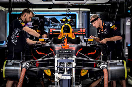 KUALA LUMPUR, MALAYSIA - SEPTEMBER 28, 2017 : Mechanics to Red Bull Racing driver Red Bull Racing,...