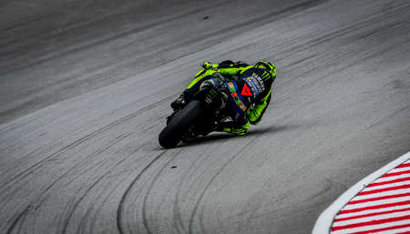 SEPANG, MALAYSIA - NOVEMBER 03, 2019 : Valentino Rossi (46) of Italy and Yamaha Factory Racing during the Malaysia Motorcycle Grand Prix (MotoGP) at Sepang International Circuit (SIC).のeditorial素材