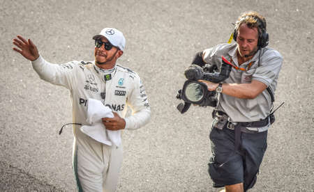 KUALA LUMPUR, MALAYSIA - SEPTEMBER 30, 2017 : Pole position qualifier Lewis Hamilton of Great Britain and Mercedes GP during qualifying for the Malaysia Formula One Grand Prix at Sepang Circuitのeditorial素材