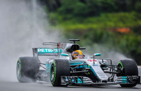 KUALA LUMPUR, MALAYSIA - SEPTEMBER 29, 2017 : Lewis Hamilton of Great Britain driving the (44) Mercedes AMG Petronas F1 Team Mercedes F1 WO8 on track during practice for the Malaysia Formula One Grand Prix at Sepang Circuit.のeditorial素材