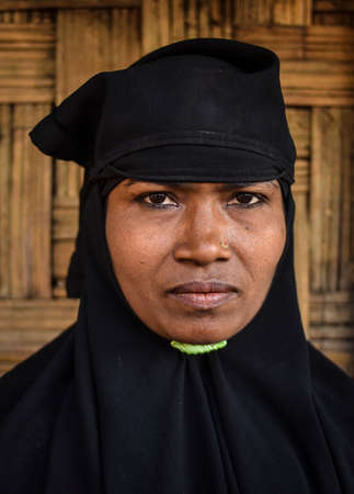 COX' BAZAR, BANGLADESH - MARCH 16, 2019 : Face of Rohingya refugees from Myanmar waiting for food aid in Kutupalong refugee camp near Cox's Bazar, Bangladesh.のeditorial素材