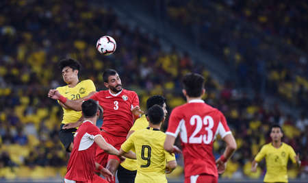 Kuala Lumpur, Malaysia - September 10, 2019 : Malaysia and Jordan player in action during FIFA World Cup Qatar 2022 and AFC Asian Cup China 2023 Preliminary Joint Qualification Round 2 at National Stadium Bukit Jalil.のeditorial素材