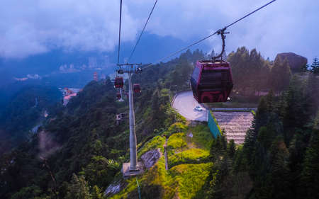 GENTING HIGHLAND, MALAYSIA - JANUARY 8, 2020 : Awana Skyway cable car, one of Genting Highland's most popular attractions, providing a method of travel between Genting Premium Outlet and Sky Avenue mallのeditorial素材