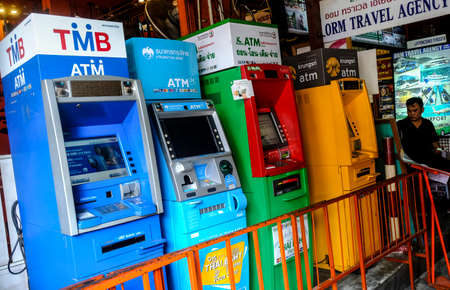 BANGKOK, THAILAND - NOVEMBER 18, 2017 : A few ATM machines near at popular backpacker destination Khao San Road. The area is famous for its street market in Thailand.のeditorial素材