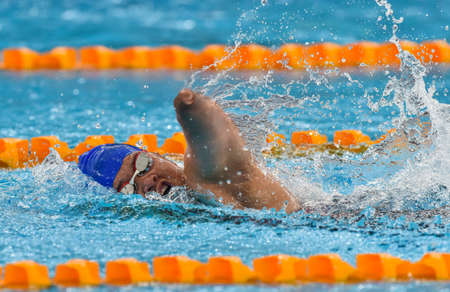 Kuala Lumpur, Malaysia - April 30, 2017 : Disabled swimming athlete during 9th Para ASEAN Games 2017 at Bukit Jalil Aquatic Centre.のeditorial素材