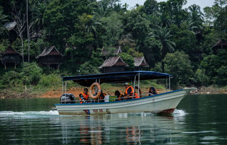 A beautiful scene at Kenyir Lake, Terengganu, Malaysia. Kenyir Lake also known as Tasik Kenyir, it is the largest man-made lake in South East Asia with an area of 260,000 hectaresのeditorial素材