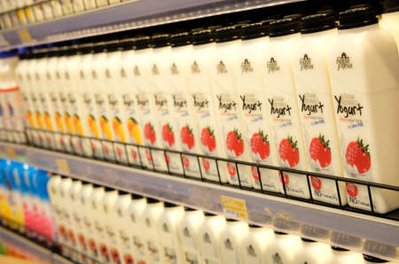 KUALA LUMPUR, MALAYSIA - SEPTEMBER 15, 2019 : Strawberry farm fresh yogurt on the shelf at supermarket.のeditorial素材