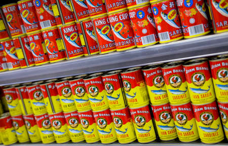 KUALA LUMPUR, MALAYSIA - SEPTEMBER 15, 2019 : Ayam Brand Mackerel Tomato Sauce on the shelf at supermarket.のeditorial素材