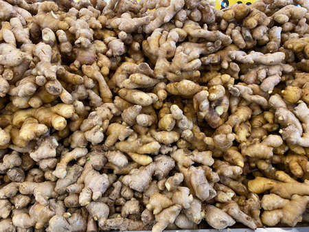 KUALA LUMPUR, MALAYSIA - APRIL 15, 2020 : Fresh ginger display on the shelf at supermarket.のeditorial素材
