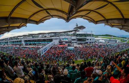 KUALA LUMPUR, MALAYSIA - OCTOBER 01, 2017 : Formula one (F1) fans celebrate on track for last race...