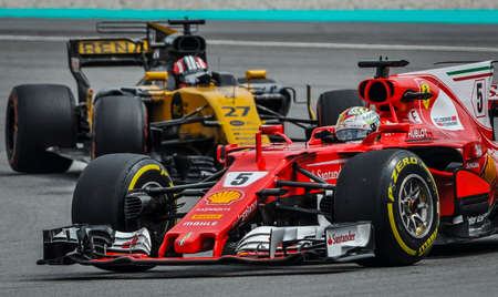 KUALA LUMPUR, MALAYSIA - OCTOBER 1, 2017 : Sebastian Vettel of Germany and Ferrari on track during...